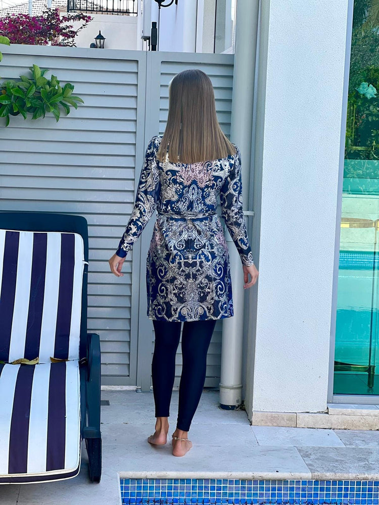 
            
                Load image into Gallery viewer, Rock Your World Swim Tunic
            
        