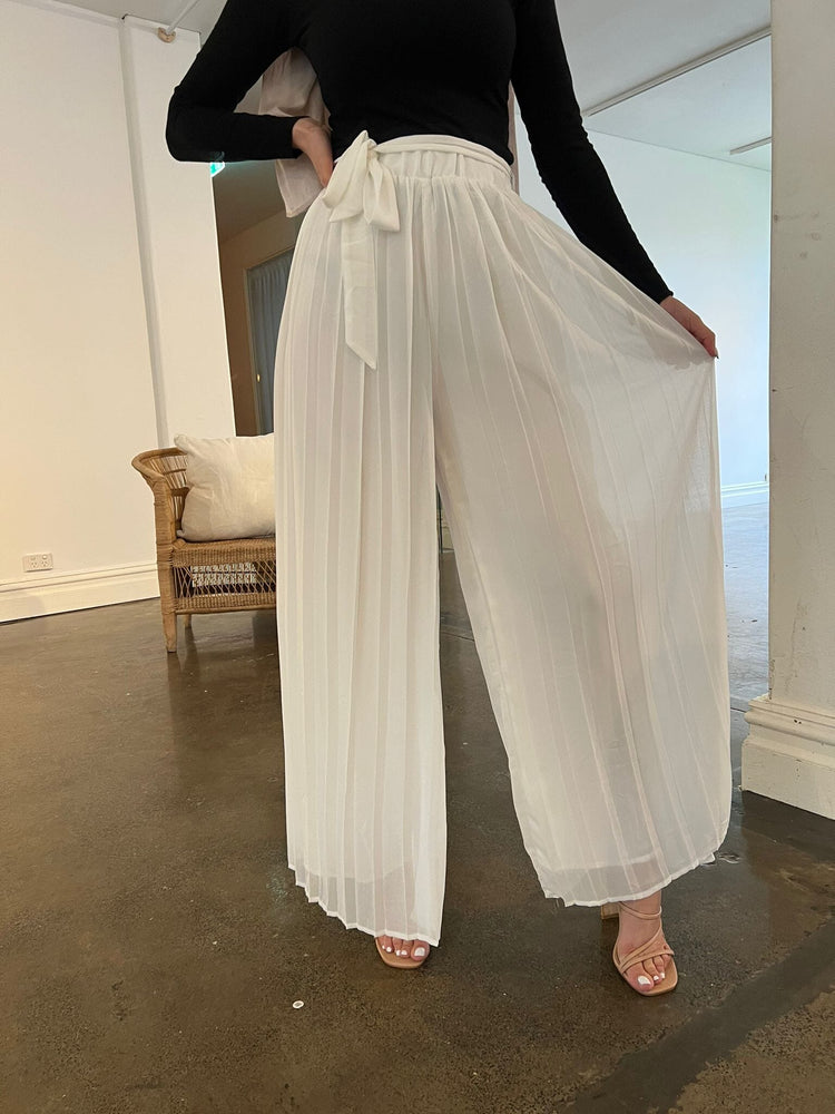 
            
                Load image into Gallery viewer, Pleated Flare Pants
            
        